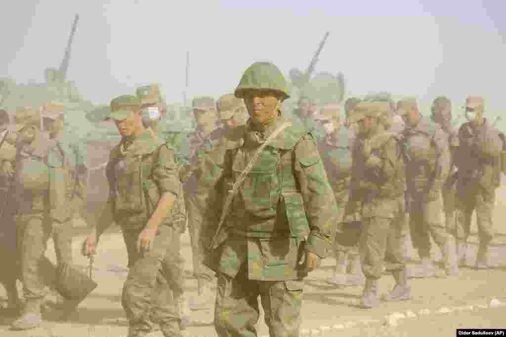 Soldiers from Tajikistan march during the drills. 