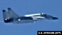 A photo released by AFRICOM reportedly shows a Russian MiG-29 Fulcrum jet flying over Libya.