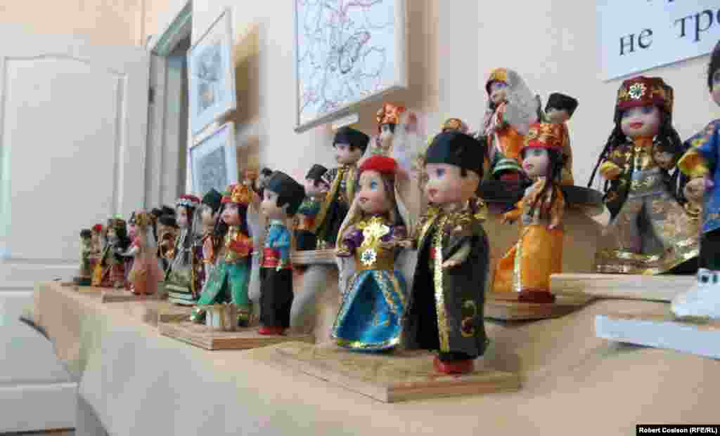 Dolls in traditional costumes at a Tatar art and culture museum in Semferopol. 