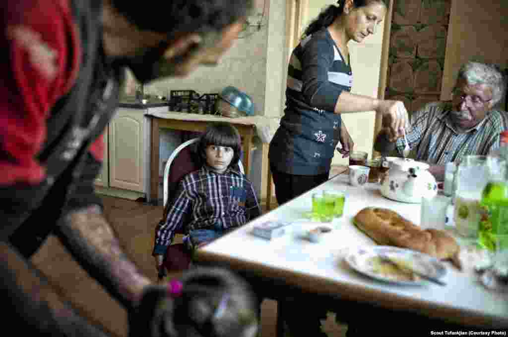 A refugee family from Syria in the town of Berdzor in Nagorno-Karabkah. Many ethnic Armenians spoke to Tufankjian of feeling comfortable everywhere; others felt permanently isolated. &quot;I still feel like an outsider here,&quot; one Baku-born Armenian, now living in the United States, told her. &quot;And I&#39;m an outsider in Armenia. So to me I don&#39;t know if I&#39;ll truly be comfortable somewhere.&quot; &nbsp;