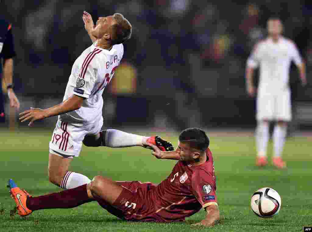 The teams played through one stoppage and nearly 40 minutes of scoreless football until flares thrown toward the Albanian players interrupted play.