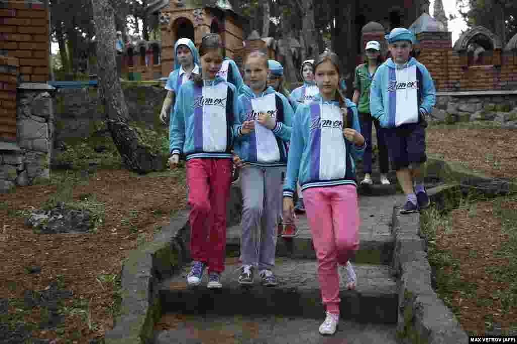 Children at Artek in May 2015.Following the Russian annexation of Crimea in 2014 Russia, Moscow poured millions of dollars into revamping the seaside camp, and it was swiftly reopened with a Kremlin-friendly program.Neumann told RFE/RL that under Russian control Artek has served as "both as a showpiece of Russian resurgence and as a bridge to the Soviet past," with a view to "shaping young minds, promoting a state-sanctioned image of history, and cultivating loyalty to the Russian state."