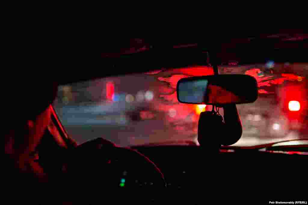 Mikhail Momot, a brother and co-worker of one of the victims of the Severnaya accident, drives his car through the streets of Vorkuta. He was on vacation on February 25. At about 2:45 p.m., he'd just returned home from shopping when he noticed cars and trucks from the Emergency Situations Ministry speeding through town on their way to the Severnaya coal mine. Without thinking, he rushed to the mine himself. There he learned of a serious explosion in the pit, and until 3 a.m. he labored with rescuers to reach the miners nearly 800 meters below the surface. These frantic initial rescue efforts succeeded in bringing around 80 miners to the surface alive. But four other miners were found dead and 26 more were missing, including Mikhail's older brother, Konstantin.