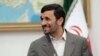 Iran - Iranian President Mahmud Ahmadinejad speaks with photographers while waiting for a meeting at the presidential palace in Tehran, 06Apr2008