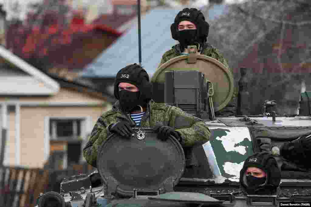 Servicemen are seen in a BMP-3 infantry fighting vehicle. Victory Day is an important holiday on Russia's calendar, with world leaders invited to Moscow. France's Emmanuel Macron and India's Narendra Modi had promised to attend this year's celebration.