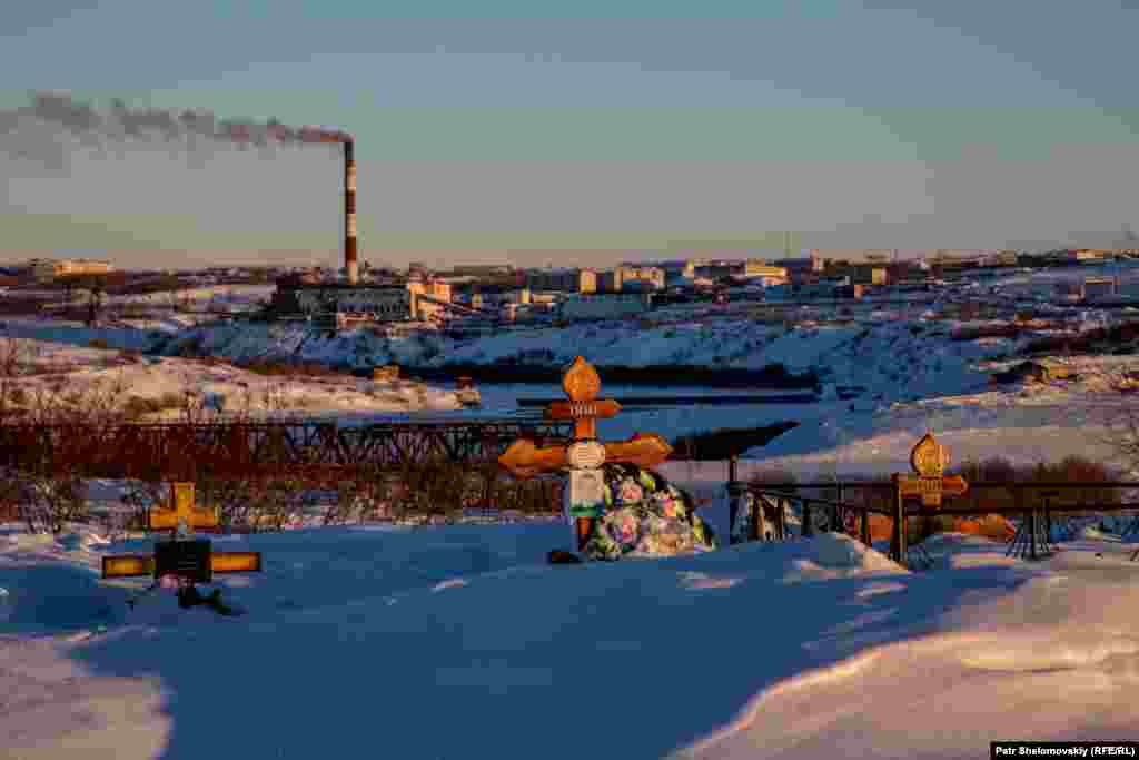 A miners' cemetery in Vorkuta overlooking the Vorkutinskaya coal mine