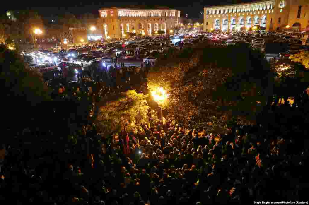 Crowds gather outside a government building in the early hours of November 10 after Armenian Prime Minister Nikol Pashinian announced via social media that he had signed a Russian-brokered deal to end the conflict in Nagorno-Karabakh. 