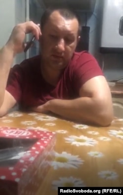 Denys Kulykovskiy purportedly speaking with a separatist official.