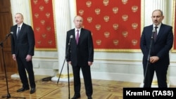 RUSSIA -- Russian President Vladimir Putin, Azerbaijani President Ilham Aliyev and Armenian Prime Minister Nikol Pashinian attend a joint press conference following a trilateral meeting at the Kremlin in Moscow, January 11, 2021