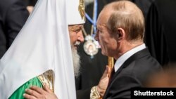 Довоєнна фотографія. Президент Росії Володимир Путін (праворуч) і патріарх Московський Кирило на одному із заходів, присвячених 1025-річчю Хрещення України-Руси. Київ, 27 липня 2013 року