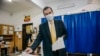 Ludovic Orban, the Romanian prime minister and leader of the National Liberal Party (PNL), casts his vote in parliamentary elections on December 6. 