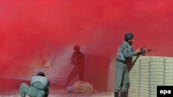 Afghan police who were trained by British soldiers of NATO's International Security Assistance Force