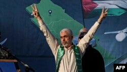 سنوار په غزې تړانګه کې د یوې جلسې پر مهال - د ۲۰۲۱ز کال د مې ۲۴مې انځور.