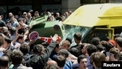 At least 17 people were injured after gay rights campaigners were attacked by antigay activists in Tbilisi in May 2013.