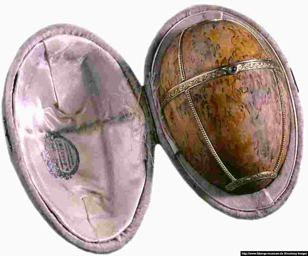 Time was running out for both the royal family and Faberge. The Karelian Birch Egg was the last Faberge would complete. Finished shortly after the tsar was forced to abdicate during the February Revolution of 1917, the invoice sent by Faberge addressed Nicholas not as "Tsar of all the Russians" but as "Mr. Romanov, Nikolai Aleksandrovich." The royal family was held captive by Bolsheviks as civil war raged in Russia.