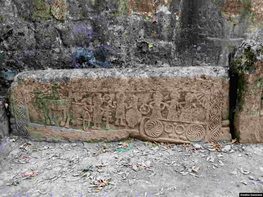 A stone carving lies in the courtyard of St. Hovhannes. The church is believed to have been built in the 13th century. 