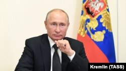Russian President Vladimir Putin takes part in a video conference call with officials and public representatives of the region of Daghestan on May 18.