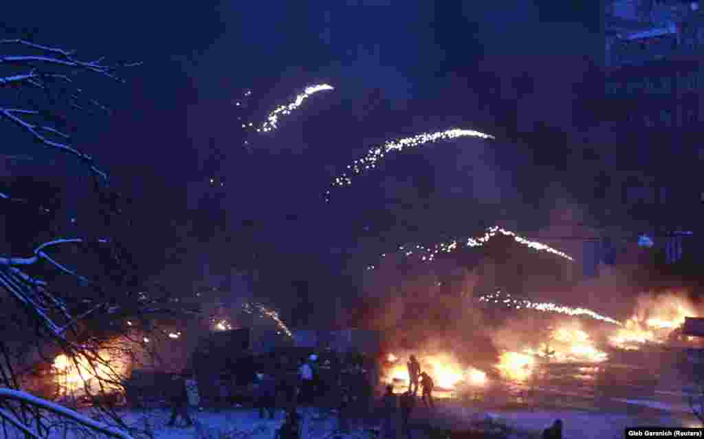 Protesters set off fireworks during a clash with police.