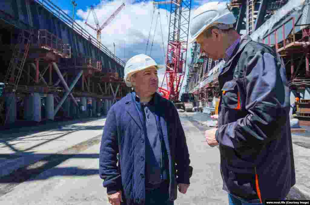 Arkady Rotenberg (center) visits the construction site. The construction magnate won the multibillion-dollar contract to build the bridge in 2015. Rotenberg is a childhood friend of Vladimir Putin and has amassed enormous personal wealth, mostly through construction contracts awarded by the Russian state. He was sanctioned by the European Union and the United States for his role in the Ukraine crisis.