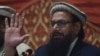 حافظ سعید د جماعت الدعوه ډلې مشر دی او دا ډله د پاکستان د حکومت لخوا تر بندیز لاندې ده: انځور له ارشیفه
