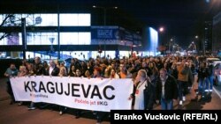 Antigovernment protesters take to the streets in the the southern Serbian town of Kragujevac on March 23.