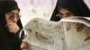 در کرج و ورامين به طور همزمان دستکم ۱۴ زن کشته شده اند. (عکس از AFP)