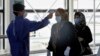 Iranian Health Officials Play Down President's '25 Million Infected' Estimate