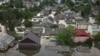 Homes in a flooded area of Ukraine’s Kherson region on June 7, a day after the Kakhovka dam was breached.