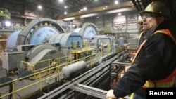 John Pearson, Centerra Gold company's Vice President Investor Relations, looks on at the gold-mining plant at the Kumtor mine.