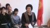 President Roza Otunbaeva casts her ballot in Bishkek. "We are prepared to face any challenges," she says.