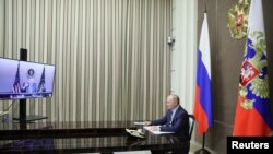 Відеокадри вітання презилдентів США та Росії Джо Байдена та Володимира Путіна, 7 грудня 2021 року