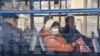 COVID-19: Kazakhstan Locks Down Two Main Cities; Iran Warns Virus Could Kill 'Millions'