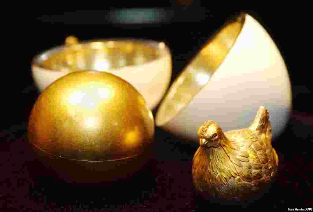 A tradition was hatched in 1885 when Tsar Alexander III commissioned Peter Carl Faberge to create an Easter gift for his wife, the tsarina. The jeweler delivered this white enamel egg, which twists open to reveal a golden "yolk" hiding a ruby-eyed hen. The tsarina was delighted with the gift, and Faberge was soon named official jeweler to the tsar.
