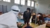 COVID-19: Mirziyoev Reprimands Uzbek Health Minister, Regional Officials Over Efforts To Battle Virus