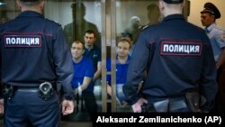 Ukrainian sailors who were captured and taken into Russian custody in November 2018 attend a court hearing in Moscow on May 27.