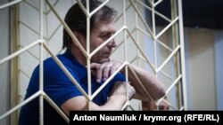 Volodymyr Balukh appears in Crimea's Rozdolne district court on May 15.