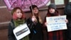 Activists protested near the headquarters of the 1+1 TV channel in Kyiv on January 4.