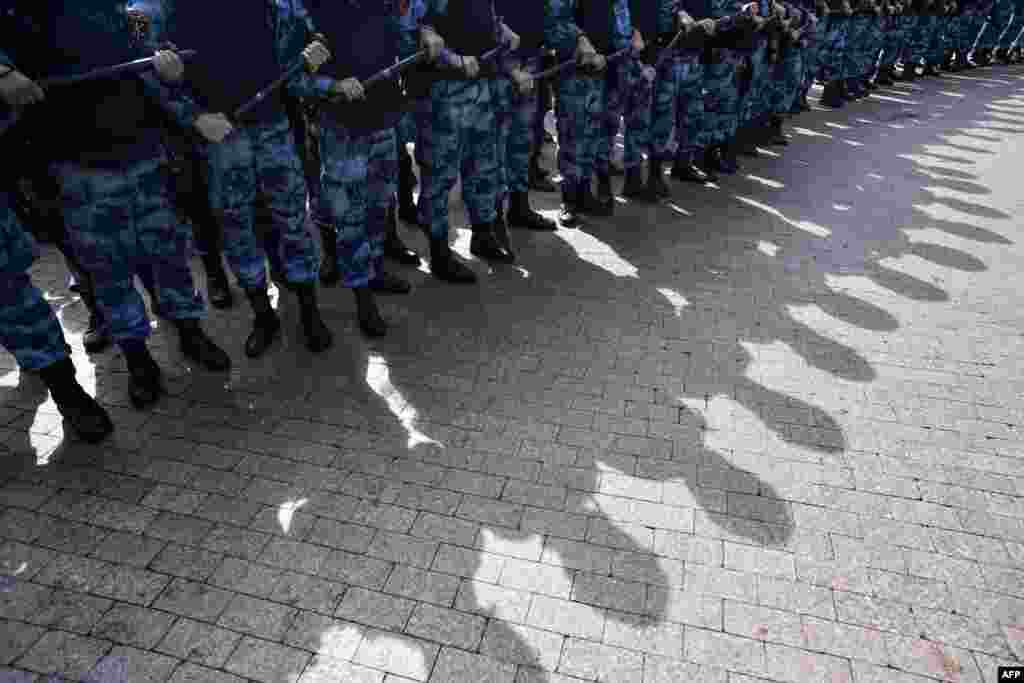 Batons ready, members of Russia's National Guard were also on hand to prevent the demonstrators gathering.