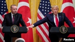 Erdogan and US President Donald Trump in Washington, November 2019.