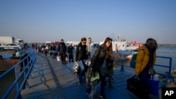 Refugiați ucraineni vin cu bacul în România