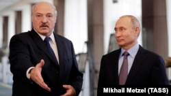 Vladimir Putin (right) and Russia will watch to see if cracks show in Alyaksandr Lukashenka's control over Belarusian security forces.